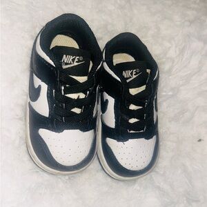 Nike Black and White Sneakers with Bold Swoosh